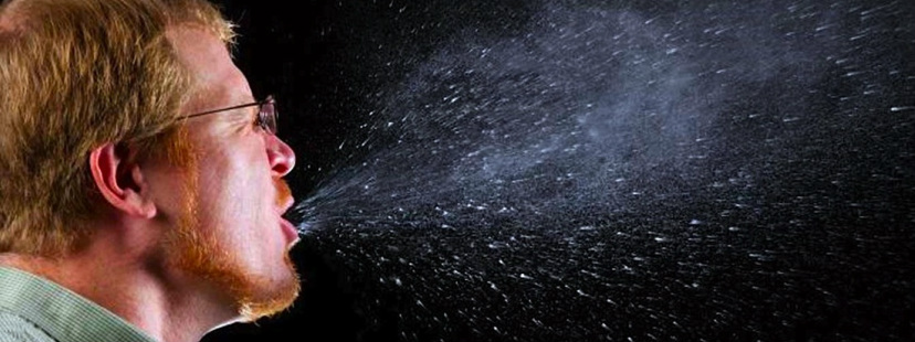 Spray from sneezing man